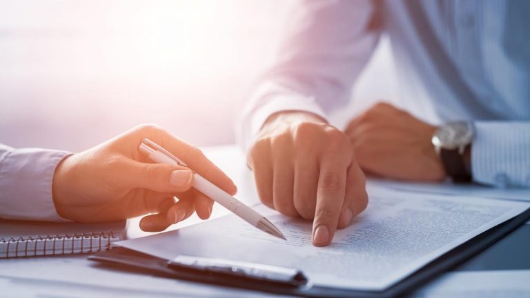 Hands with paperwork