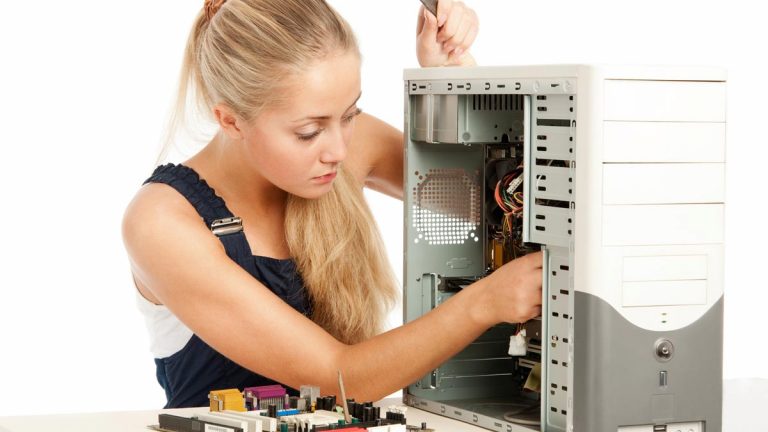 Girl repairing a desktop computer