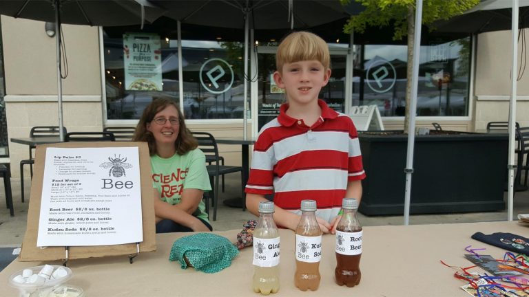 Selling products at a children's business fair