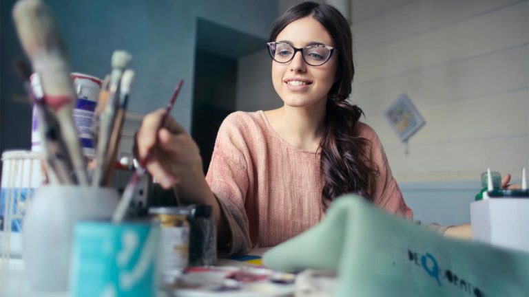 Girl with paint brush